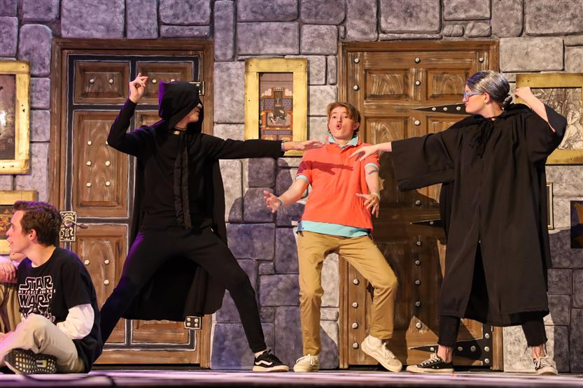 Students perform onstage